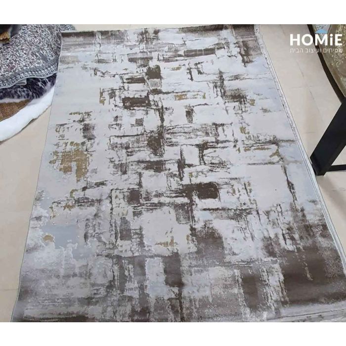 שטיח אבסטרקטי חום בז' מודרני יוקרתי דגם פלורנסיה 7595B. השטיח האיכותי מתאים לסלון, לחדר שינה, לחדר ילדים, למסדרון, לפינת ישיבה, לפינת משחקים, למטבח, לפינת אוכל, לחדר עבודה ולמשרד. 