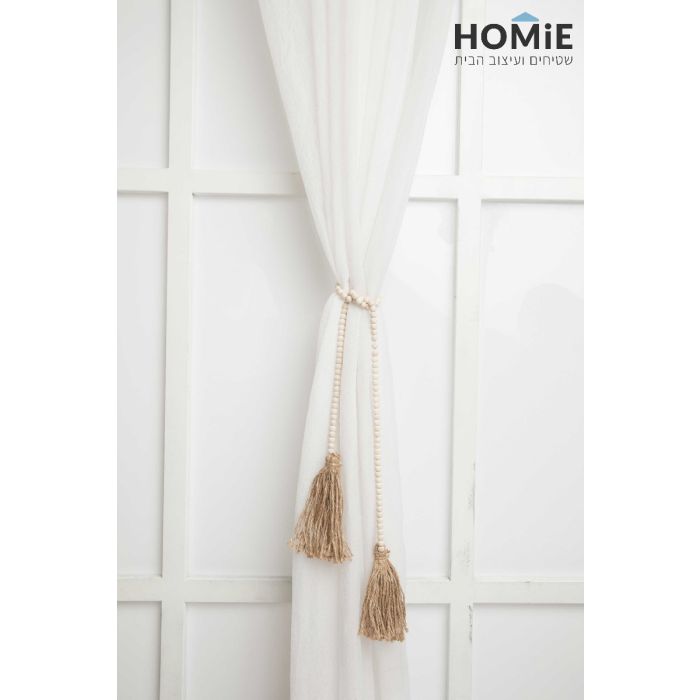 חבק וינטג' דקורטיבי לוילון בצבע בז' דגם סנסה 01. החבק המהודר והיוקרתי המגיע בסגנון הרטרו כפרי ישדרג את מראה הוילון שלכם בכמה רמות ויאסוף אותו בצורה אפקטיבית ונעימה לעין. 