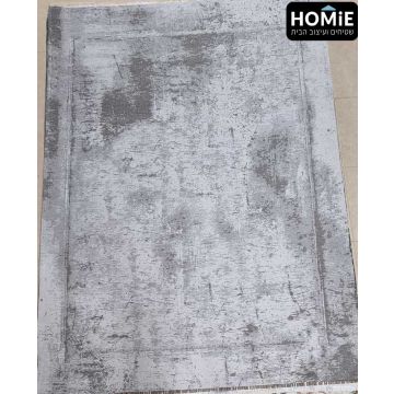 שטיח אבסטרקטי גיאומטרי מודרני שניל דגם רוברטו 04 בצבע אפור בהיר ואפור כהה. השטיח היוקרתי מגיע במבנה מופשט מדהים יחד עם מסגרת גיאומטרית מרשימה שביחד מעניקים לשטיח נראות של יצירת אומנות מופלאה. 