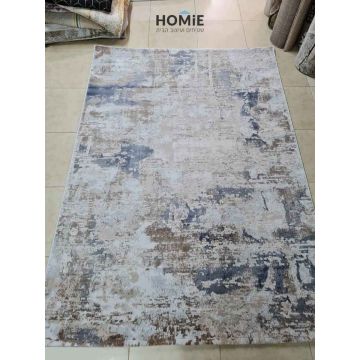 שטיח אבסטרקטי מודרני יוקרתי דגם פלורנסיה 7787 בצבע כחול, חום, בז' ואפור. השטיח האיכותי מתאים לסלון, לחדר שינה, לחדר ילדים, לחדר/פינת משחקים, לאמבטיה, למסדרון, לפינת ישיבה, לפינת אוכל, למטבח, לחדר עבודה ולמשרד. 