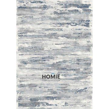 שטיח אבסטרקטי מודרני כחול תכלת אפור דגם קמילה 24/31. השטיח היוקרתי העשוי היטסט-ויסקוזה ישתלב בסלון, חדר שינה, חדר ילדים, מסדרון, חדר אורחים, פינת ישיבה, פינת אוכל, מטבח, חדר עבודה ומשרד. 