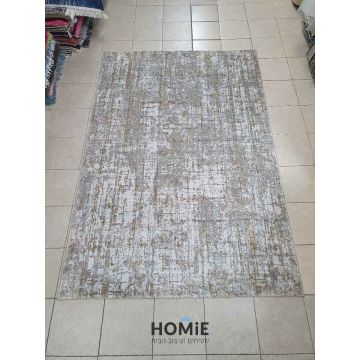 שטיח אבסטרקטי מודרני יוקרתי דגם קטרינה 50A בצבע אפור, בז' ושמנת. השטיח המהודר ישתלב בצורה נהדרת בסלון, בחדר שינה, בחדר ילדים, בפינת משחקים, במסדרון, באמבטיה, במטבח, בפינת אוכל, בחדר עבודה ובמשרד.