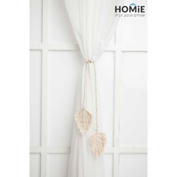 חבק וינטג' דקורטיבי לוילון בצבע שמנת דגם סנסה 02. החבק המהודר והיוקרתי בעל לוק רטרו כפרי, ישדרג את מראה הוילון שלכם בכמה רמות ויאסוף אותו בצורה אפקטיבית ונעימה לעין. 