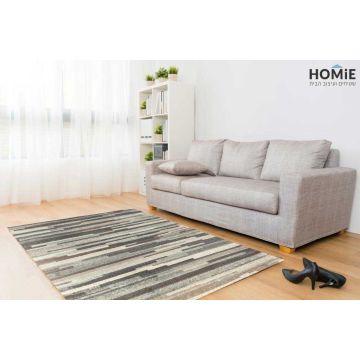 שטיח גיאומטרי אבסטרקטי מודרני פסים אסימטריים דגם ונוס 11 בצבעי אפור, חום ובז'. השטיח היוקרתי ישתלב בסלון, חדר שינה, חדר ילדים ותינוקות, מסדרון, חדר אורחים, חדר משחקים, פינת ישיבה, פינת אוכל, מטבח, חדר עבודה ומשרד. 