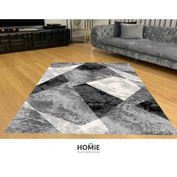 שטיח גיאומטרי אבסטרקטי צורות אפור שחור מודרני יוקרתי דגם ג'וליה 93A. השטיח מתאים לסלון, לחדר שינה, לחדר ילדים, לאמבטיה, למטבח, למסדרון, לפינת אוכל, לחדר עבודה ולמשרד. 