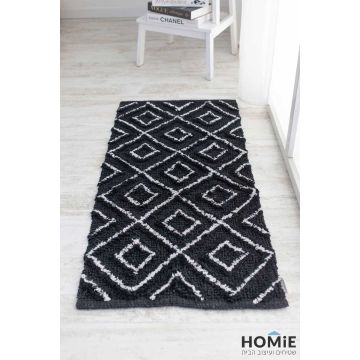 שטיח כותנה גיאומטרי מודרני מעויינים שחור לבן דגם סאקורה 06. השטיח היוקרתי הכפרי יתאים לסלון ושאר חלל הבית.