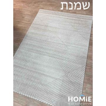 שטיח סלון גיאומטרי דגם סומטרה בצבע שמנת, מונח על פרקט, מראה את כל השטיח בשלמותו.