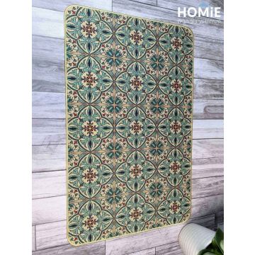 שטיח גומי למטבח בעיצוב פרחוני וינטג' טורקיז – דגם קוויבק 24, מונח על רצפת פרקט בגוון אפור, מצולם בשלמותו מלמעלה