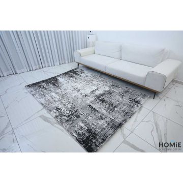 שטיח אבסטרקטי מודרני שיש שחור אפור דגם לורן 12. השטיח היוקרתי משתלב בסלון, חדר שינה, חדר ילדים ותינוקות, מסדרון, חדר משפחה ואורחים, חלל הכניסה לבית, פינת אוכל, מטבח, חדר עבודה ומשרד. 