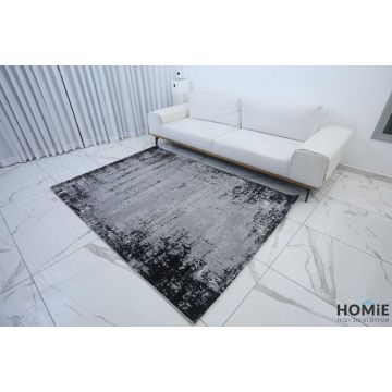 שטיח אבסטרקטי מודרני שיש אפור שחור דגם לורן 09. השטיח היוקרתי משתלב בסלון, חדר שינה, חדר ילדים ותינוקות, מסדרון, חדר משפחה ואורחים, חלל הכניסה לבית, פינת אוכל, מטבח, חדר עבודה ומשרד. 