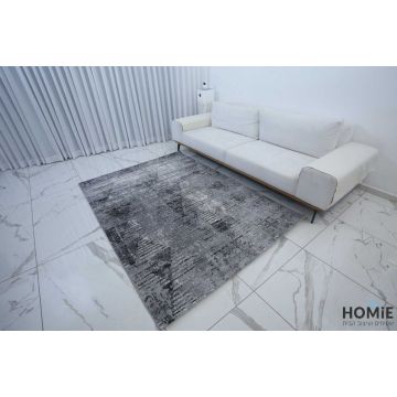 שטיח אבסטרקטי מודרני שיש אפור שחור דגם לורן 13. השטיח היוקרתי משתלב בסלון, חדר שינה, חדר ילדים ותינוקות, מסדרון, חדר משפחה ואורחים, חלל הכניסה לבית, פינת אוכל, מטבח, חדר עבודה ומשרד. 