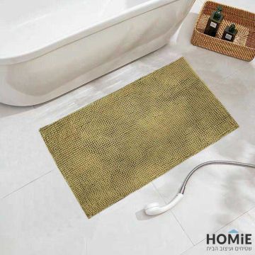 שטיח אמבטיה שניל מודרני פונפונים בז' דגם מלודי 05. השטיח היוקרתי מתאים גם לשירותים ושאר חלל הבית. הוא מגיע בקונסטלציית פונפונים נעימה למגע ושכבה בתחתית שמונעת החלקה. 