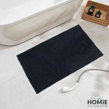 שטיח אמבטיה שניל מודרני פונפונים שחור דגם מלודי 01. השטיח היוקרתי יתאים גם לשירותים ושאר חלל הבית. הוא מגיע בקונסטלציית פונפונים מגניבה ונעימה למגע ושכבה בתחתית שמונעת החלקה. 