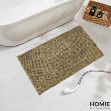 שטיח אמבטיה שניל מודרני פונפונים חום דגם מלודי 04. השטיח היוקרתי מתאים גם לשירותים ושאר חלל הבית. הוא מגיע בקונסטלציית פונפונים מגניבה ונעימה למגע ושכבה בתחתית שמונעת החלקה. 