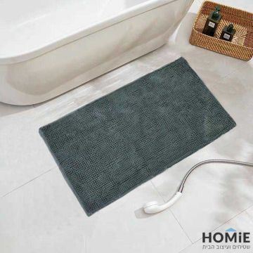 שטיח אמבטיה שניל מודרני פונפונים אפור כהה דגם מלודי 02. השטיח היוקרתי מתאים גם לשירותים ושאר חלל הבית. הוא מגיע בקונסטלציית פונפונים מגניבה ונעימה למגע ושכבה בתחתית שמונעת החלקה. 