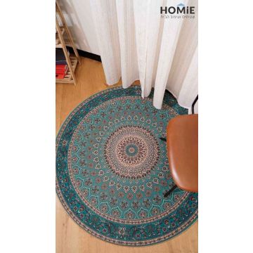 שטיח גומי עגול דגם קוויבק 35, מוצג במלואו על רצפת פרקט, וינטג' מודרני מנדלה בצבעי טורקיז ובז', יציב ונעים למגע