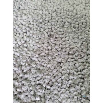 שטיח שאגי מודרני עבה פונפונים אפור יוקרתי דגם ספלנדיד. השטיח בסגנון הכפרי יתאים לסלון, לחדר שינה, לחדר ילדים, לחדר אורחים, לחדר/פינת משחקים, לאמבטיה, למסדרון, לפינת אוכל, למטבח, לחדר עבודה, למשרד, לגן ילדים ובית הספר.