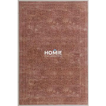 שטיח וינטג' קלאסי דגם ארתור 05 בצבע טרקוטה, עם עיצוב אתני ושבטי, מונח בסלון