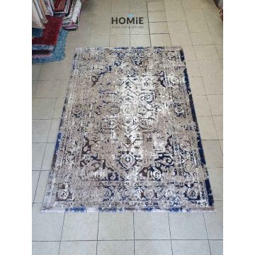 שטיח וינטג' משופשף מדליון מודרני יוקרתי דגם אלכסנדרה 22/35 בצבע חום, בז' וכחול. השטיח העשוי היטסט-ויסקוזה ישתלב בסלון, בחדר שינה, בחדר ילדים, באמבטיה, במטבח, במסדרון, בפינת אוכל, בחדר עבודה ובמשרד. 